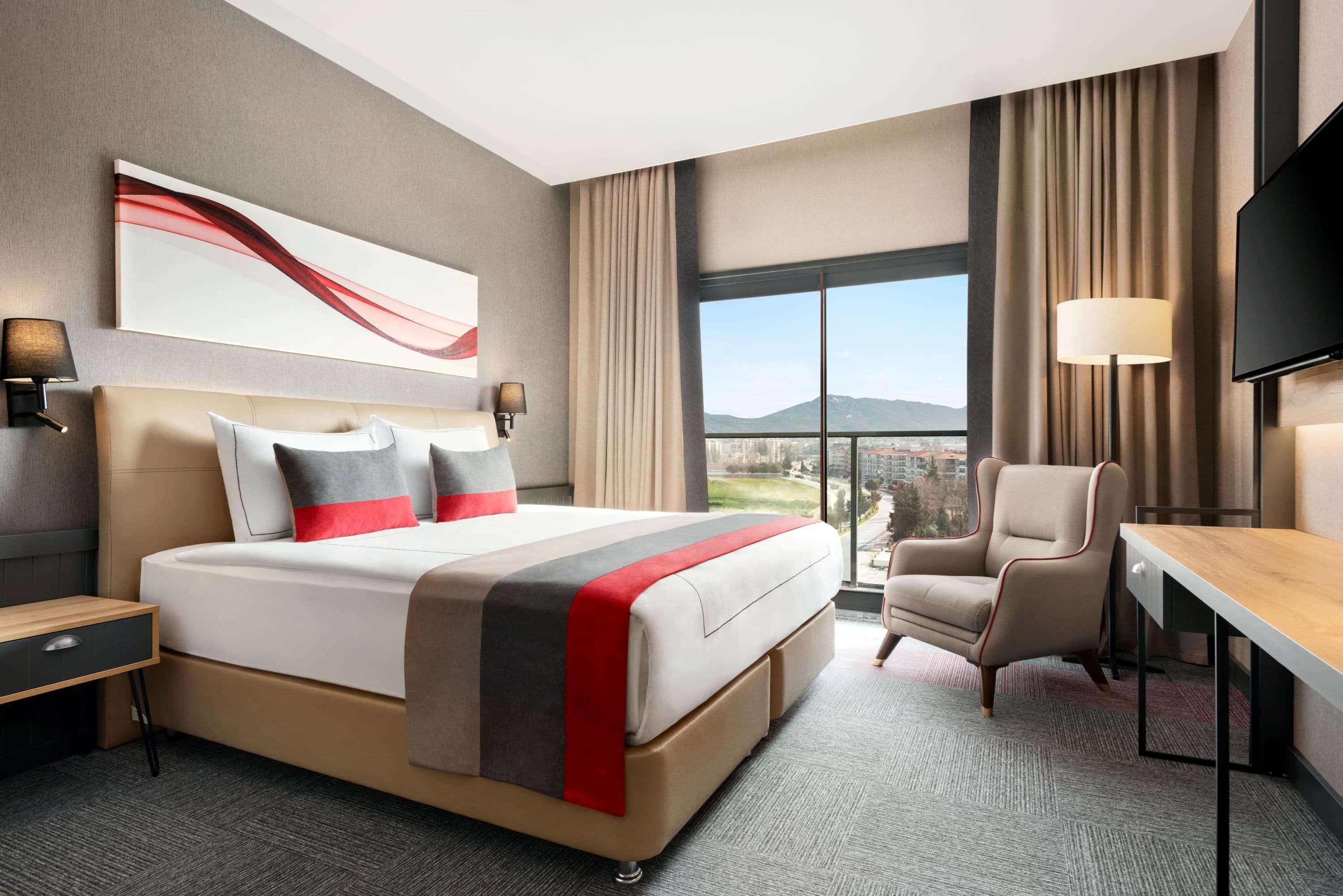 Ramada By Wyndham Tire Hotel Exterior photo